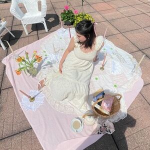 White frilly dress with purple flowers